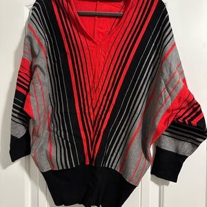 Striped women’s sweater, good condition.